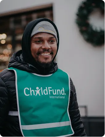 Community volunteer smiling